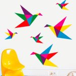 Hermoso vinilo con pájaros en origamis que salen volando